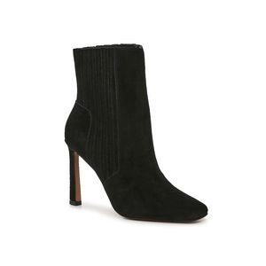 Luxe suede, a skinny heel, and a classic square toe.